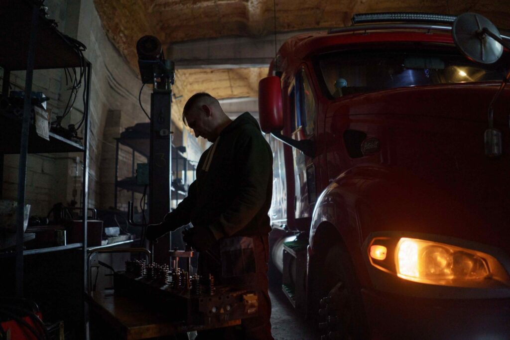 truck mechanic jobs in Canada - mechanic working on truck